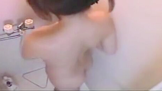 Check Out this Alluring Japanese Enchantress Taking a Seductive Shower