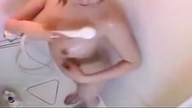 Check Out this Alluring Japanese Enchantress Taking a Seductive Shower