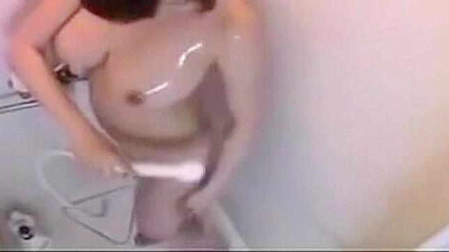 Check Out this Alluring Japanese Enchantress Taking a Seductive Shower