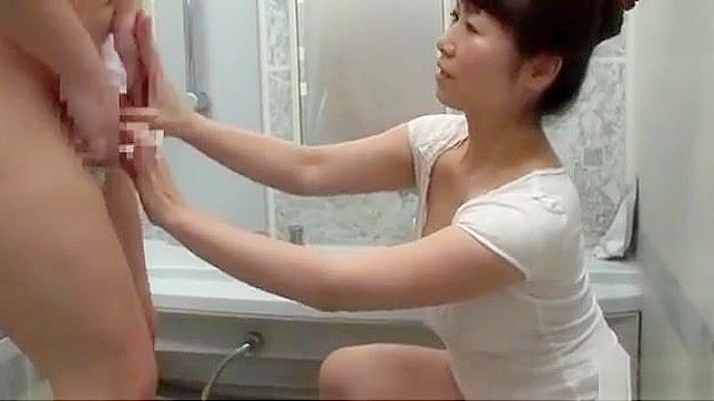 Japanese MILF Gives Mind-Blowing Blowjob While Washing Your Hair!