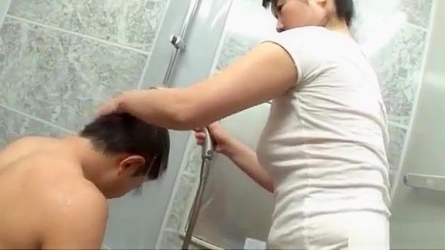 Japanese MILF Gives Mind-Blowing Blowjob While Washing Your Hair!