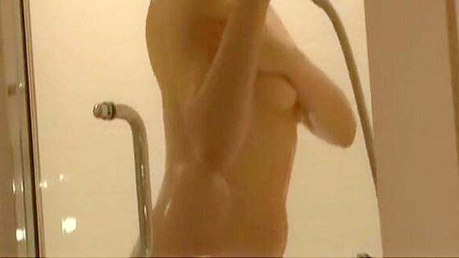 Discover the Alluring Japanese Enchantress in a Steamy JAV Shower Scene - Only for You!