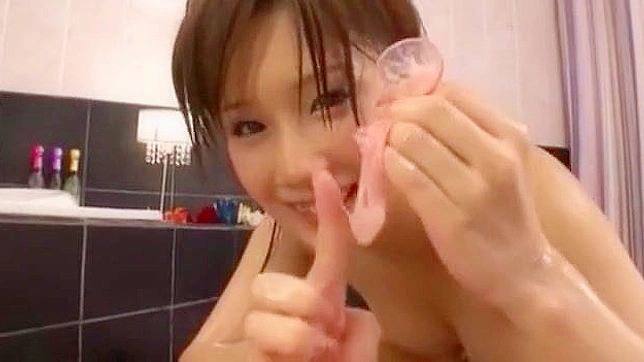 Witness the Irresistible Charm of Minami Kojima in this Foot Fetish JAV Scene