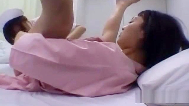 Japanese MILF Gets Her Body Washed and Kisses the Nurse on the Bed