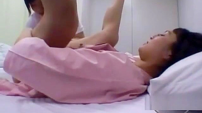 Japanese MILF Gets Her Body Washed and Kisses the Nurse on the Bed