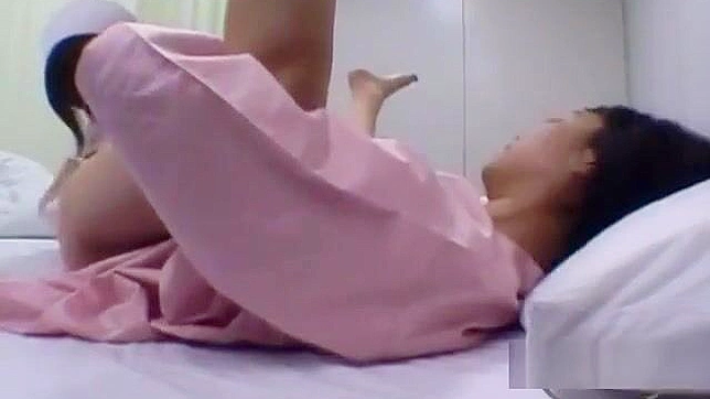 Japanese MILF Gets Her Body Washed and Kisses the Nurse on the Bed