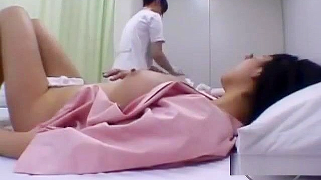 Japanese MILF Gets Her Body Washed and Kisses the Nurse on the Bed