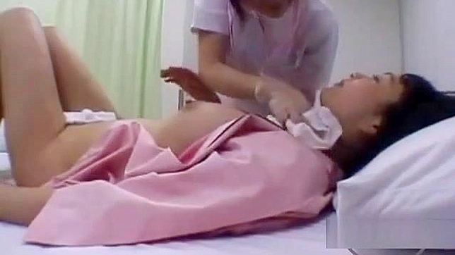 Japanese MILF Gets Her Body Washed and Kisses the Nurse on the Bed