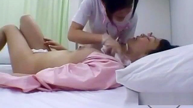 Japanese MILF Gets Her Body Washed and Kisses the Nurse on the Bed