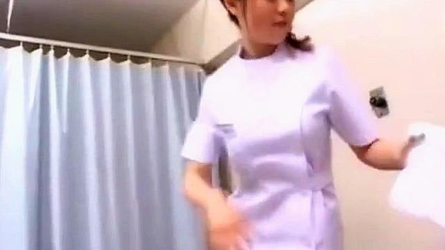 Revealing the Luscious Looks of a Sexy Japanese Nurse with a Sultry Striptease!