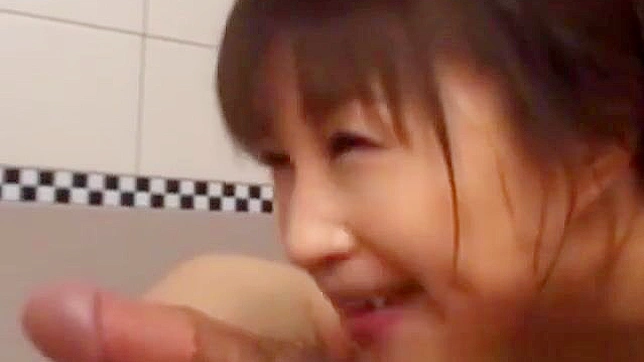 Japanese Babe's Sultry Bathroom Blowjob: An Alluring Experience!