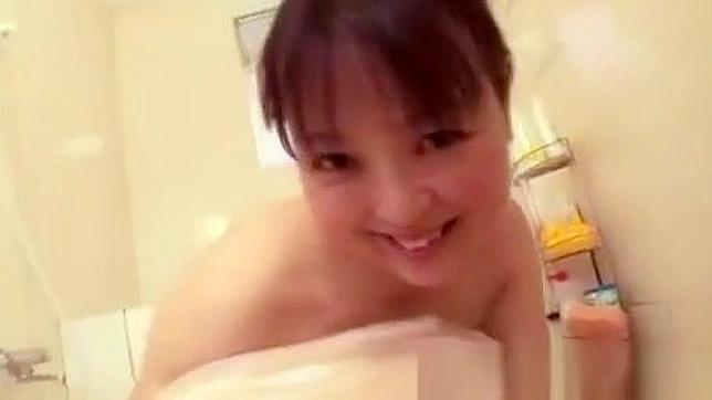 Enjoy the Sensual Shower of a Seductive Asian Enchantress!