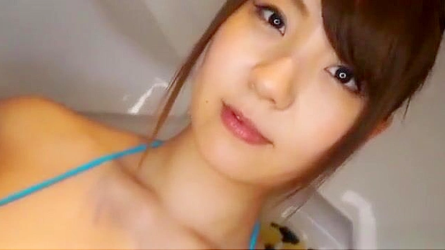 JAV Beauty with Enormous Boobs Gives Mind-Blowing Solo Show in the Shower - A Must-See!