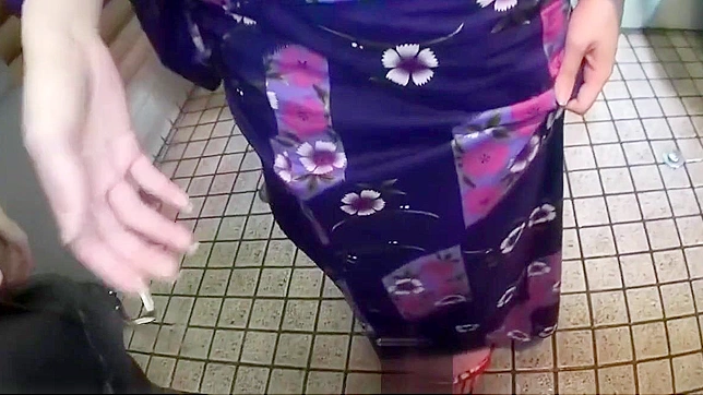 Caught on Camera: Luscious Japanese Brunette Gives Mind-Blowing Blowjob in Steamy Bathroom