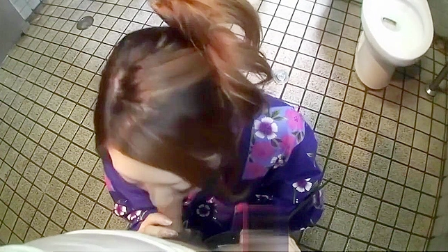 Caught on Camera: Luscious Japanese Brunette Gives Mind-Blowing Blowjob in Steamy Bathroom