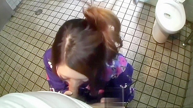 Caught on Camera: Luscious Japanese Brunette Gives Mind-Blowing Blowjob in Steamy Bathroom