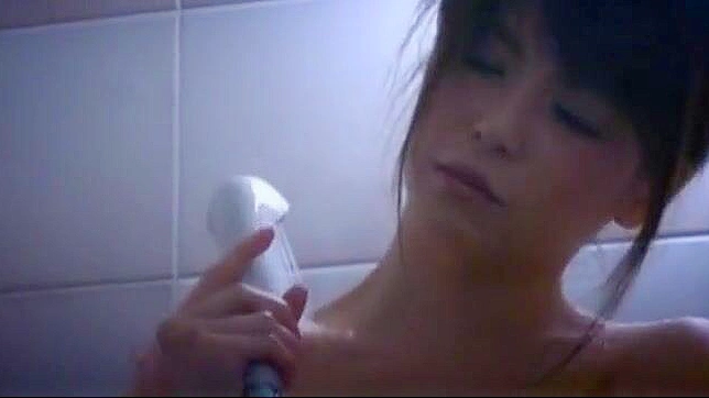 See the Sensual Riri Kuribayashi in a Revealing JAV Shower Scene: Masturbation and Alluring Body Language