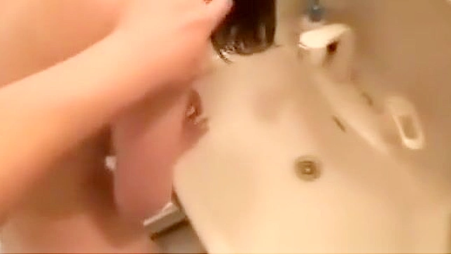 Experience the Alluring Asian MILF in a Steamy Shower Fuck!