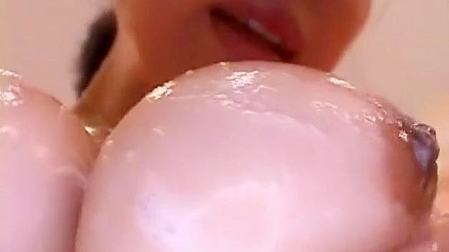 Japanese Beauty Kumi Anna's Incredible Handjobs and Big Tits in JAV Movie