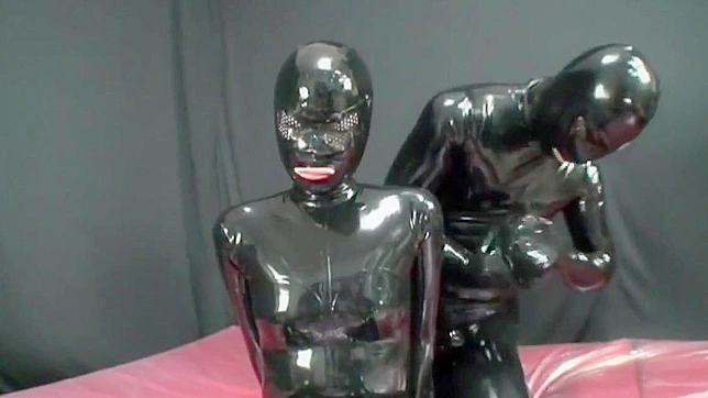 Japanese Beauty Undergoes Tough Love Training in Rubber Suit