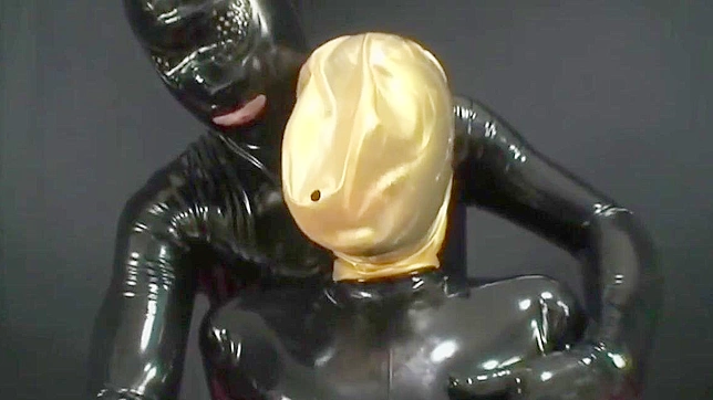 Japanese Beauty Undergoes Tough Love Training in Rubber Suit