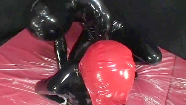 Japanese Beauty Undergoes Tough Love Training in Rubber Suit