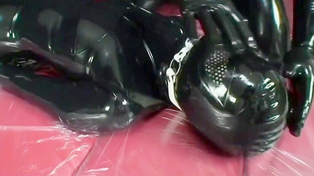 Japanese Beauty Undergoes Tough Love Training in Rubber Suit