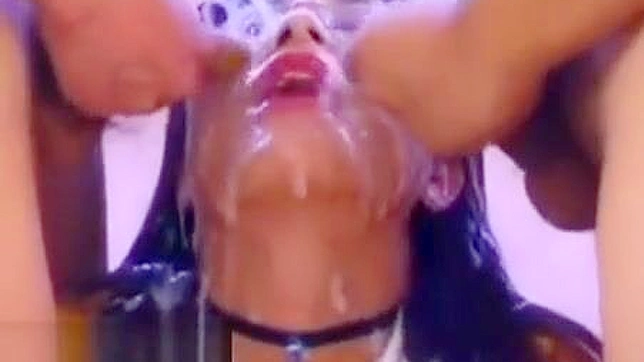 Japanese Beauty Gets a Powerful Facial Bukkake!