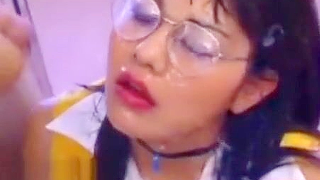 Japanese Beauty Gets a Powerful Facial Bukkake!