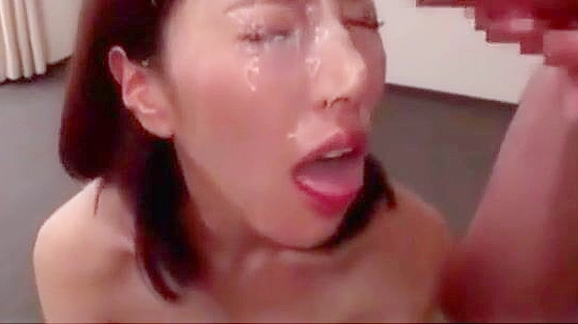 Japanese Beauty Drenched in jizz - A Must-See!