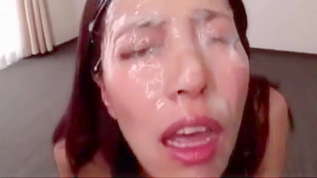 Japanese Beauty Drenched in jizz - A Must-See!