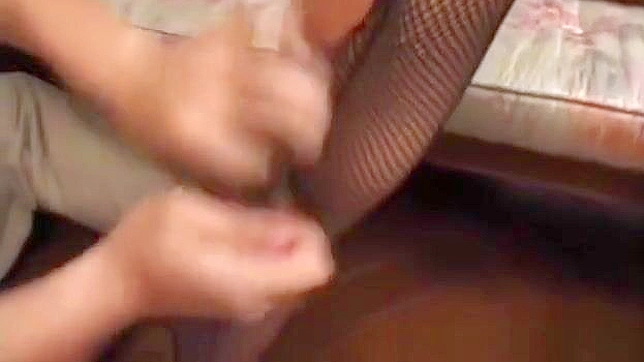 Unleash Your Desires with this Sexy Busty JAV Actress in Fishnet