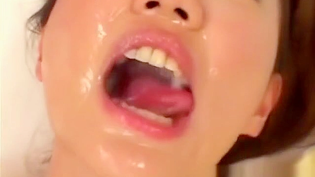 JAV Slut Drenched in Cum ~ Irresistible Asian Beauty in an Alluring Bukkake Show!