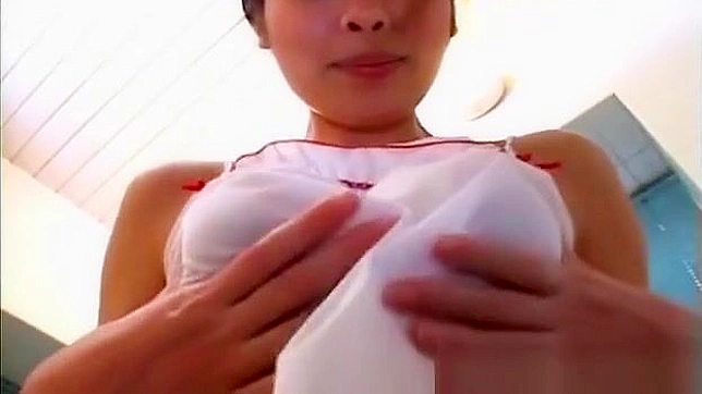 Experience the Alluring Beauty of this Busty Asian Enchantress and Her Cute Body Parts!