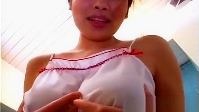 Experience the Alluring Beauty of this Busty Asian Enchantress and Her Cute Body Parts!