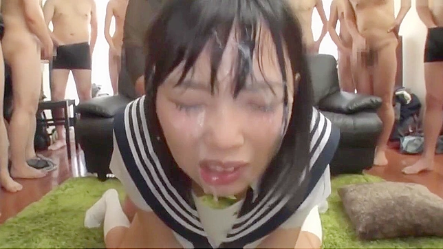 Japanese Beauty Gets Drenched in Creamy Bukkake!