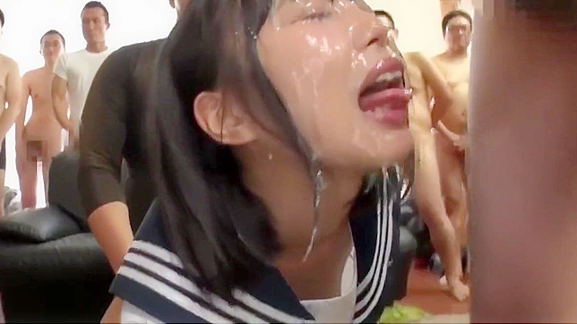 Japanese Beauty Gets Drenched in Creamy Bukkake!