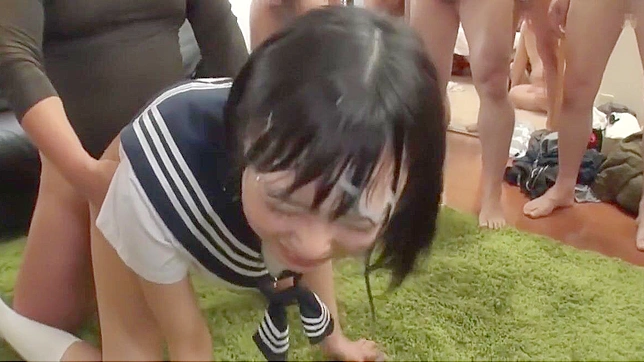 Japanese Beauty Gets Drenched in Creamy Bukkake!