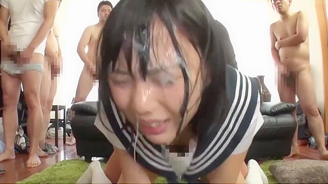 Japanese Beauty Gets Drenched in Creamy Bukkake!