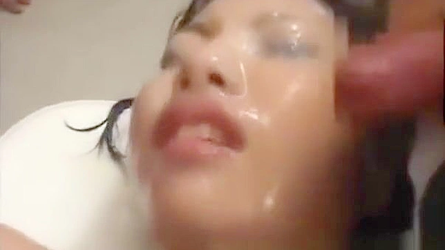 Experience the Ultimate Japanese Groupsex with a Luscious Babe Getting Bukkake and Facial!