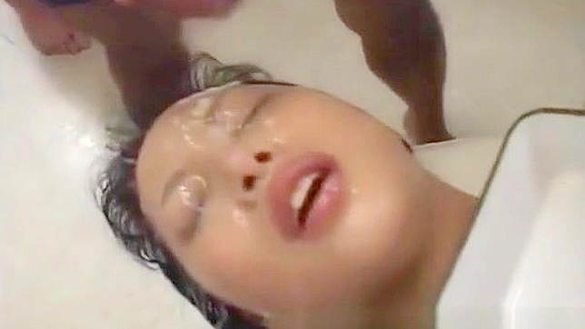 Experience the Ultimate Japanese Groupsex with a Luscious Babe Getting Bukkake and Facial!