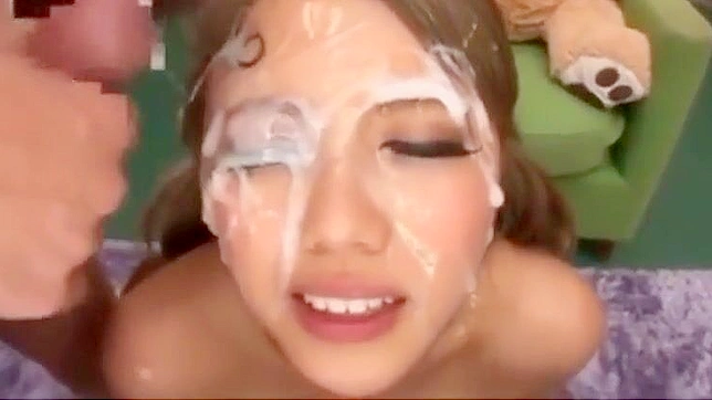 Cute as a Button! 18-Year-Old Japanese Teen Explores Her Sensuality in Massive BuKKake Debut!