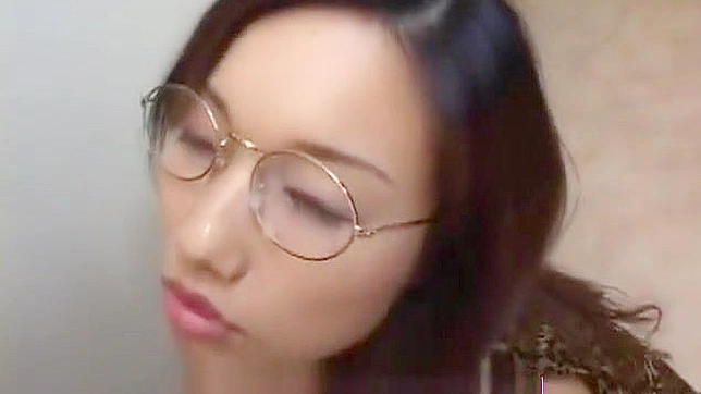 Japanese Beauty Gets Cummed on Her Glasses at a Bukkake Gangbang