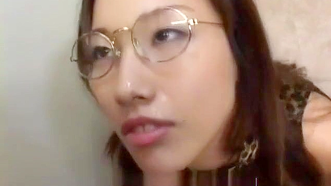 Japanese Beauty Gets Cummed on Her Glasses at a Bukkake Gangbang