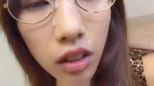 Japanese Beauty Gets Cummed on Her Glasses at a Bukkake Gangbang