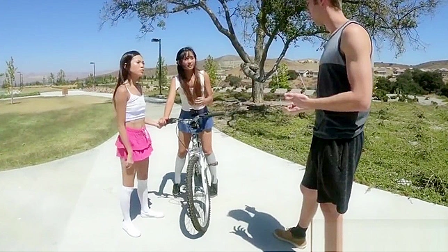 Unleashed: Two Little Asian Brats Go Wild on the Playground With More Than Just a Bike