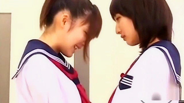 2 Luscious Schoolgirls 18+ Kissing and Patting Each Other in the Classroom