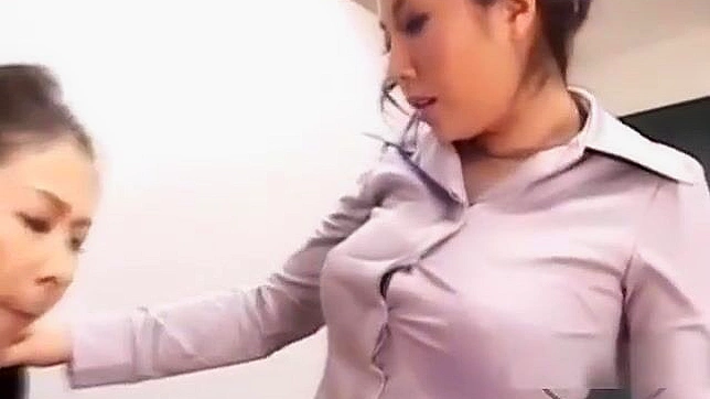 An Alluring Asian Woman with a Strap Impresses with a Sultry Chair Display: Watch Her Seductive Skills Now!