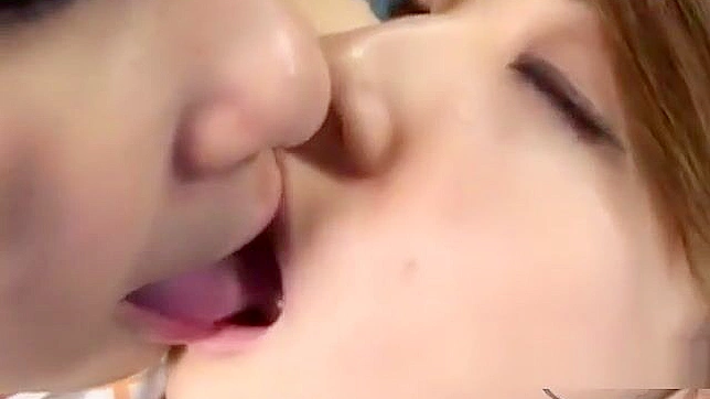 Caught in the act! 3 stunning Asian girls kissing and sucking tongues on the couch