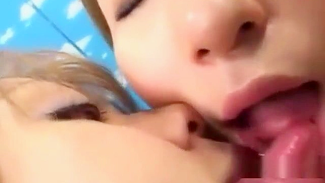 Caught in the act! 3 stunning Asian girls kissing and sucking tongues on the couch